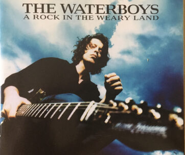 WATERBOYS - A ROCK IN THE WEARY LAND